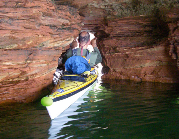 Apostle Islands - Jeff fitting through a cave opening